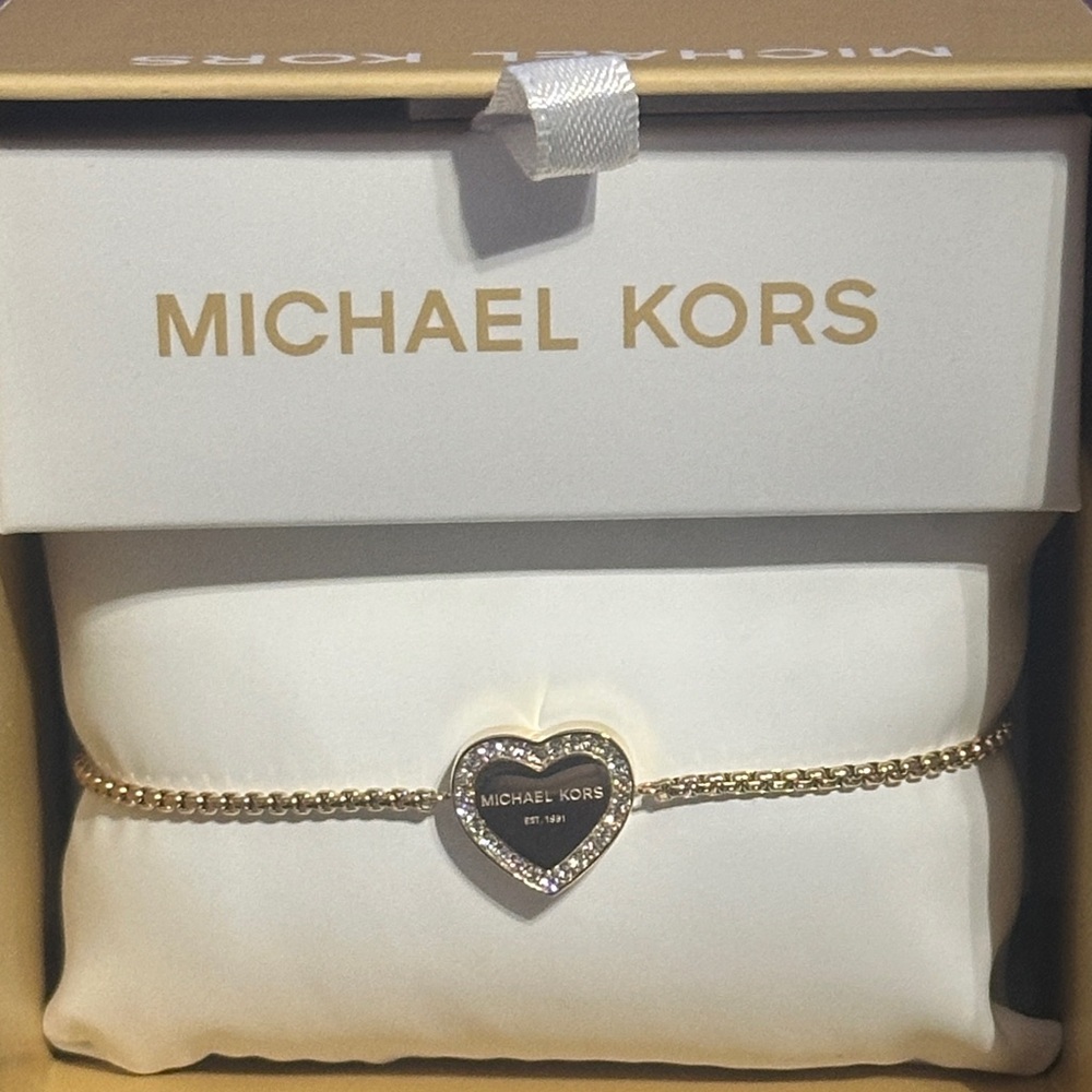 Michael Kors signature Gold  Heart slider  Bracelet with clear accent gems.